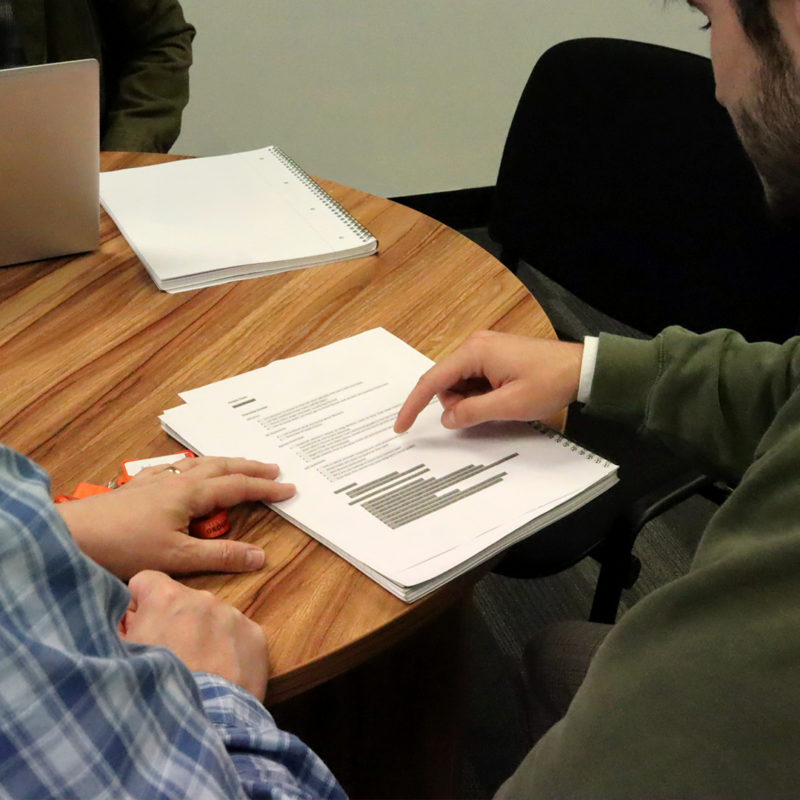 A client and member of staff discussing their finances.